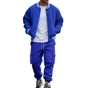 Detail view of royal blue baseball jacket and cargo pants tracksuit with ribbed collar