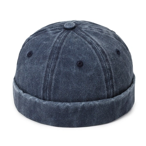 Navy blue washed denim docker hat with vintage textured six-panel crown design