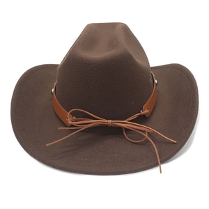 Classic brown western wool cowboy hat with leather band and decorative metal studs
