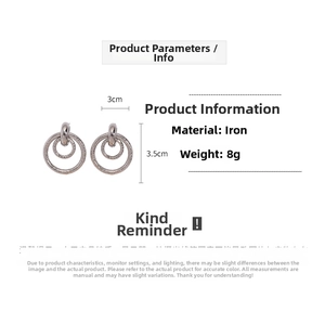 Detail view of matte silver double hollow hoop earrings with 3.5cm drop and 3cm width