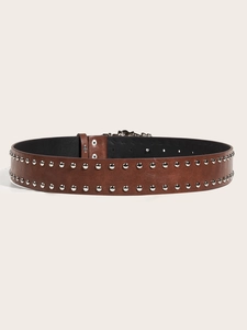 Detail view of brown leather punk belt with double rows of silver metal rivets