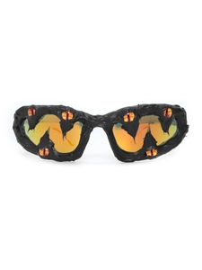 Detail of creative street style sunglasses with evil eye design and orange gradient lenses