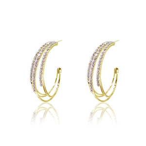 Elegant gold layered hoop earrings with sparkling zircon stones in a triple-row design