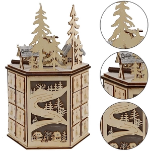 Close-up of wooden advent calendar featuring 24 drawers and laser-cut Christmas scene