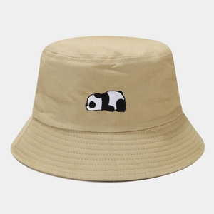 Close-up of cute panda embroidery on khaki cotton canvas sun hat with detailed stitching