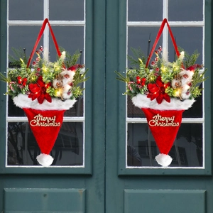 Lighted Christmas hat wreath with pine needles, red berries and warm LED lights