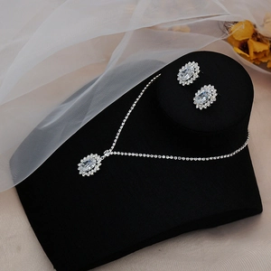 Elegant silver necklace and earrings set with teardrop zircon for bridal wedding attire