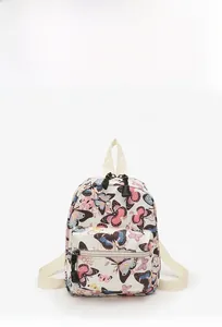Detail of colorful butterfly print on stylish canvas backpack with front zip pocket