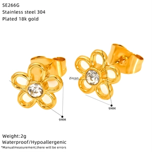 Detail view of 18k gold plated flower stud earrings with zircon inlay and product specs