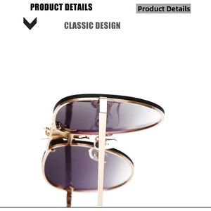 Classic aviator sunglasses with gold metal frame and purple gradient lenses macro view