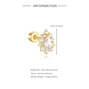 Close-up of S925 sterling silver drop earring with AAAAA zircon and golden finish