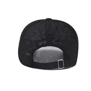 Rear view of black lace baseball cap showing floral texture and silver adjustable buckle