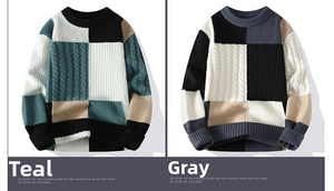 Close-up of cable knit patterns and color block patchwork on crewneck sweater