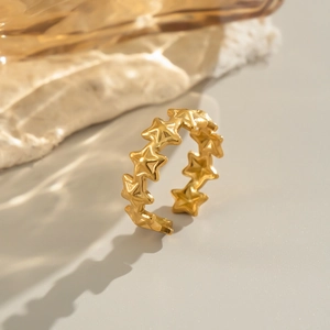 Two-tone gold and silver star open ring featuring a minimalist adjustable design
