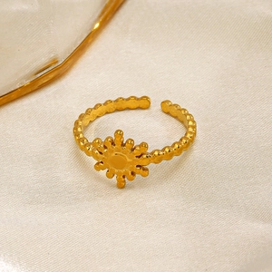 Adjustable 18K gold plated sun flower ring in stainless steel with a beaded band design