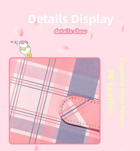 Detail showing pink plaid PU leather A6 binder surface and precision stitching