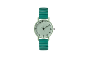 Detail of round mint green watch dial with Arabic numerals and dark green flexible band