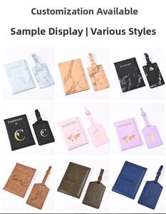 Detailed set of marble and leather passport holders with matching luggage tags in various colors