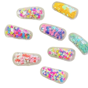 Set of 8 colorful glitter hair clips with rainbow sequins stars and smiley faces