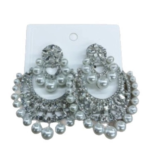 Elegant silver flower earrings featuring white pearls and sparkling rhinestone fringes