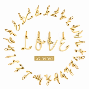 Golden stainless steel A-Z alphabet charms with heart details arranged in a circle