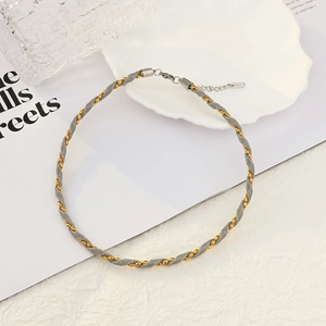 Golden and silver braided stainless steel necklace set with industrial aesthetic