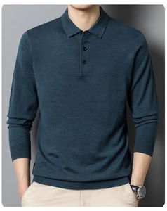 Detail of teal knit polo sweater featuring a three-button placket and ribbed texture