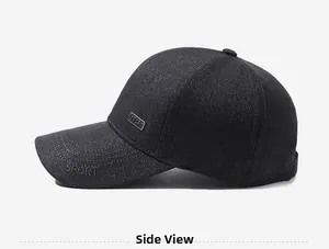 Side view of black baseball cap with silver SPORT metal badge and fine embroidery details