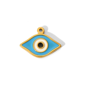 Detail of gold evil eye charm with blue enamel inlay and starburst turquoise detail