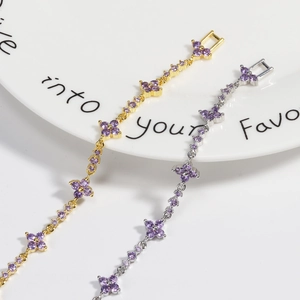 Minimalist clover flower bracelet with purple zircon in gold and silver plating