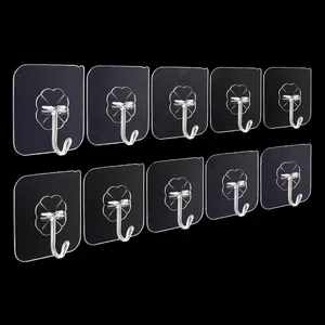 Set of 10 transparent adhesive wall hooks with clover pattern and metal hooks for home storage
