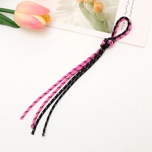 Pink and black woven phone lanyard with reflective silk on white aesthetic background