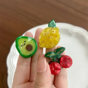 Three-piece set of fruit hair clips featuring cute avocado, lemon, and cherry designs