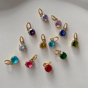Assorted colorful round crystal pendants in gold-tone stainless steel for DIY jewelry making