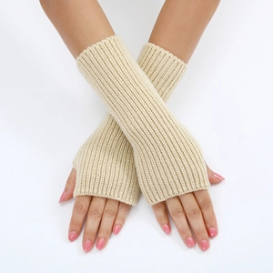 Detailed view of beige ribbed knit arm warmers with thumbholes for women