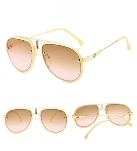 Three-view display of aviator sunglasses with gold frames and brown gradient lenses