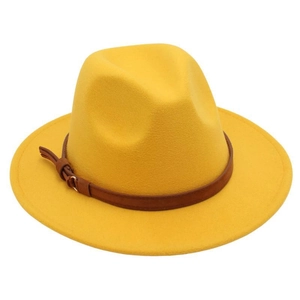 Detailed view of yellow wool felt fedora hat featuring a brown leather band and metal buckle