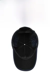 Detail view of winter ear protection cap with thick quilted lining for thermal warmth