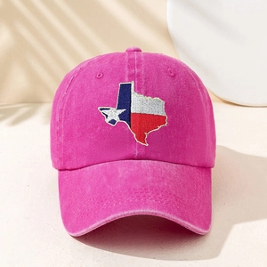 Close-up of embroidered Texas map on rose red washed cotton baseball cap with star detail