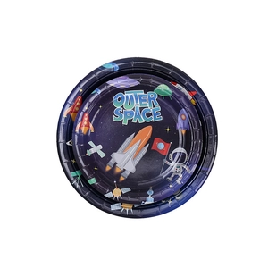 Macro shot of stacked outer space theme paper plates with rocket and astronaut prints