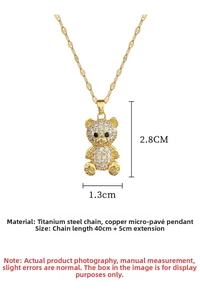Detail showing dimensions of gold bear pendant with micro-paved zircons on steel chain
