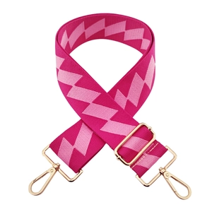 5cm wide magenta woven strap with zigzag pattern and golden metal lobster clasps