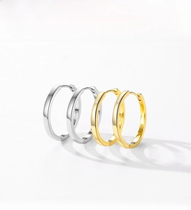 Detailed view of S925 sterling silver hoop earrings with clear hallmark engraving