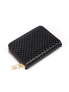Close-up of black quilted patent leather card holder with gold zipper and 45-degree view
