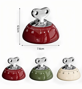 Mechanical kitchen timer showing dimensions 6.5x7.6cm and three color options