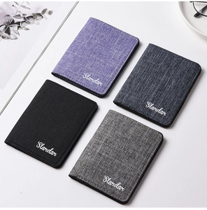 Mini canvas slim wallets in purple, black, and grey showing multiple color options