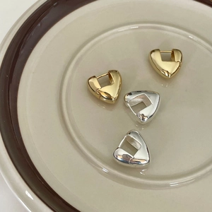 Minimalist 925 silver heart hoop earrings set in polished gold and silver finishes