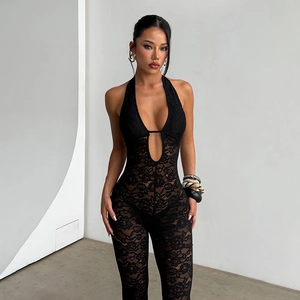 Close-up of intricate black lace patterns and halter neck cut on a sexy slimming bodysuit
