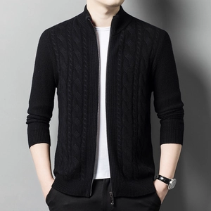 Men's black knit cardigan with stand collar and textured cable knit pattern in studio light
