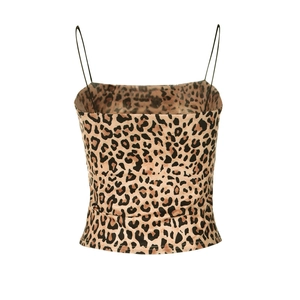 Detailed shot of leopard print crop top featuring thin spaghetti straps and animal pattern